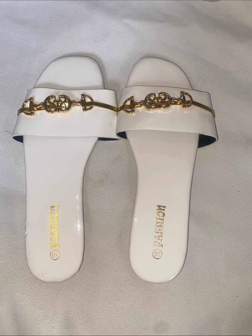 White Slide Mules with Gold Chain Accent by